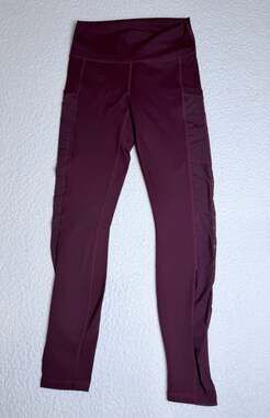 Fabletics PowerHold High-Waisted Mesh Pocket Leggings in Maroon
